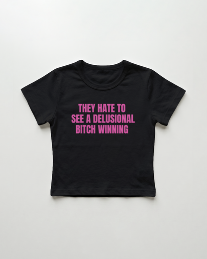 they hate to see a delusional bitch winning cropped Baby Tee