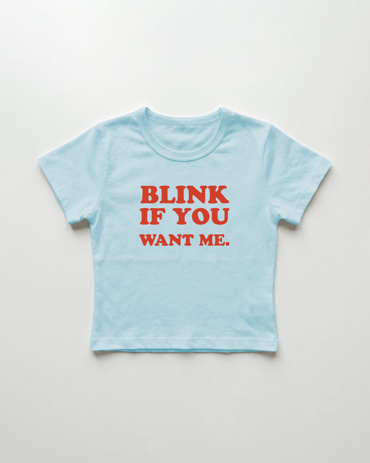 blink if you want me. cropped Baby Tee