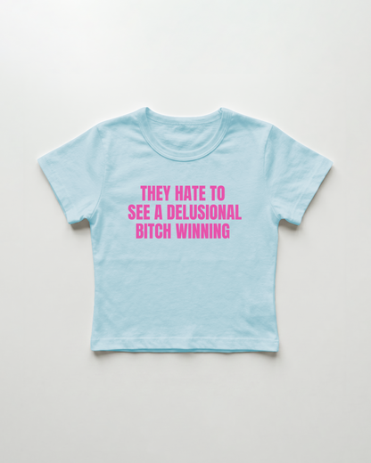 they hate to see a delusional bitch winning cropped Baby Tee