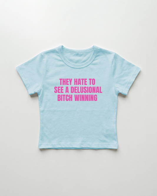 they hate to see a delusional bitch winning cropped Baby Tee