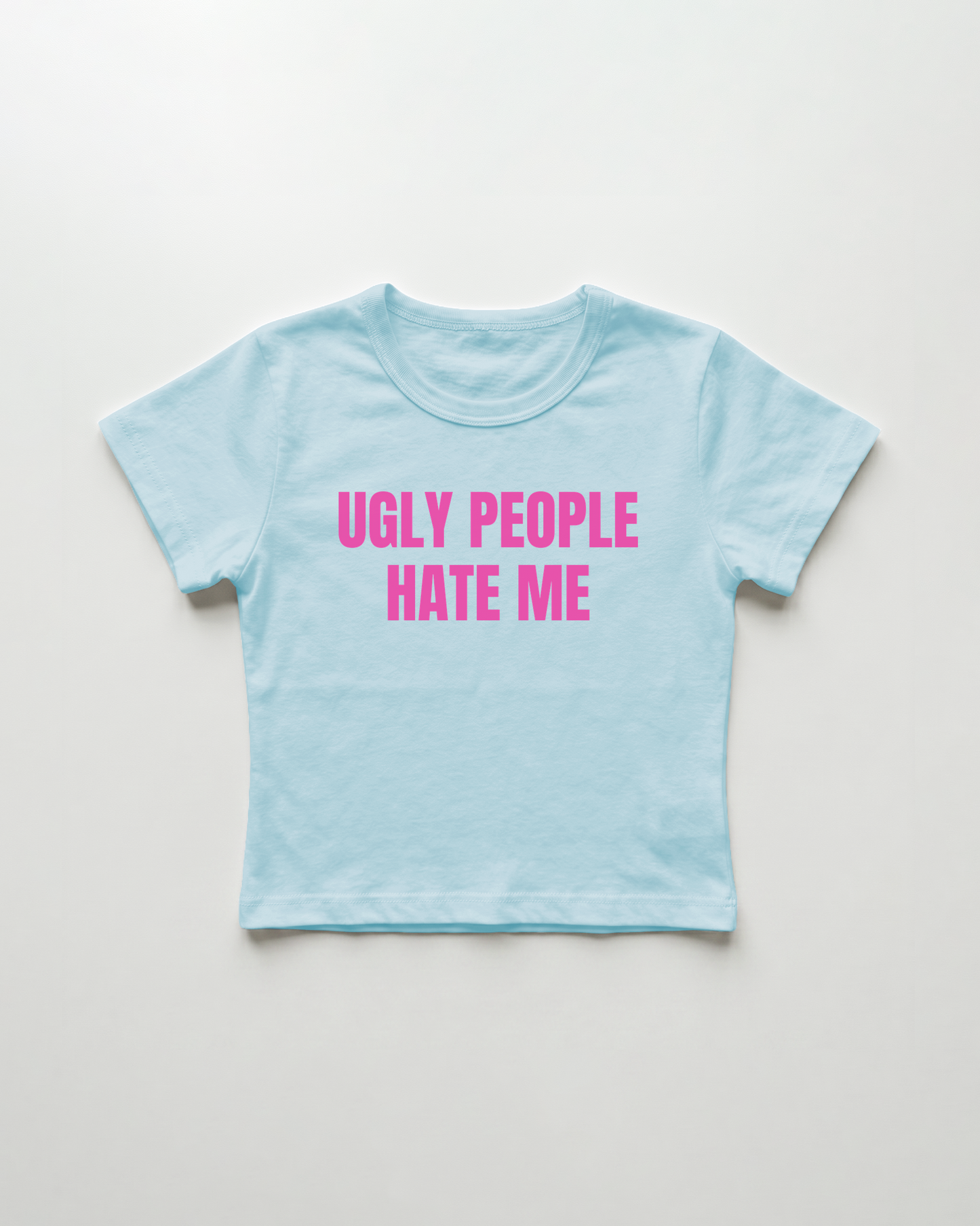ugly people hate me cropped Baby Tee