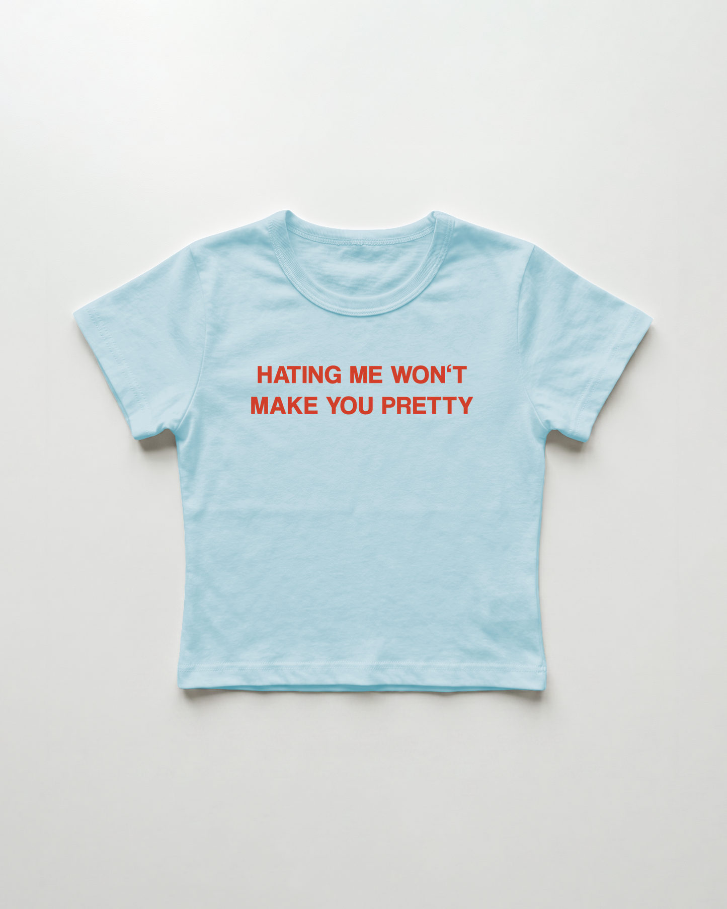 hating me won't make you pretty cropped Baby Tee