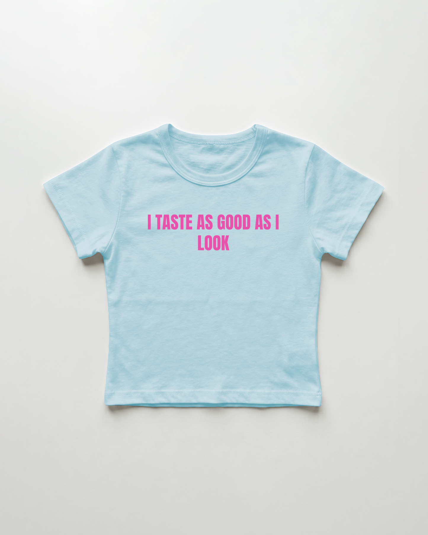 I taste as good as I look cropped Baby Tee