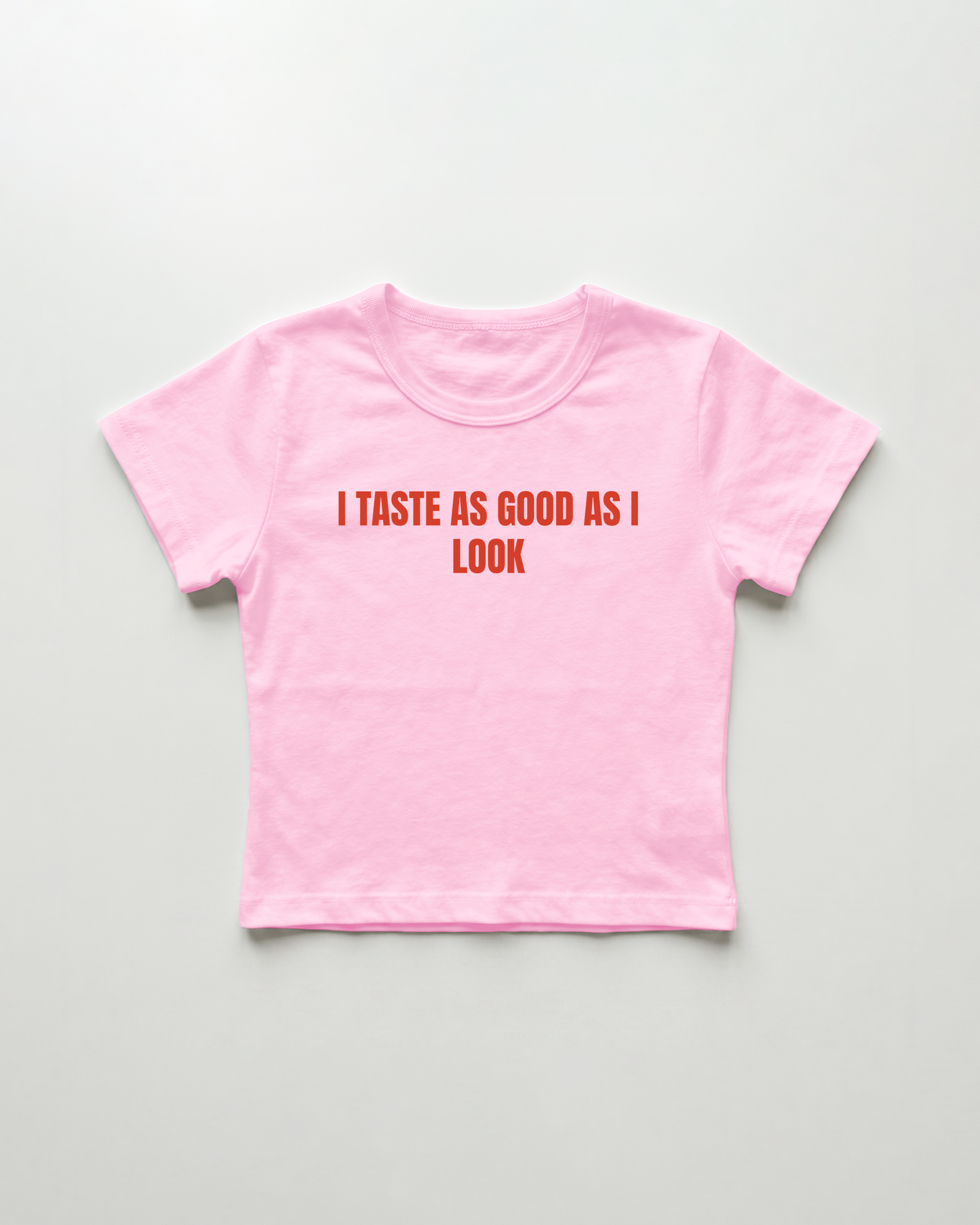 I taste as good as I look cropped Baby Tee