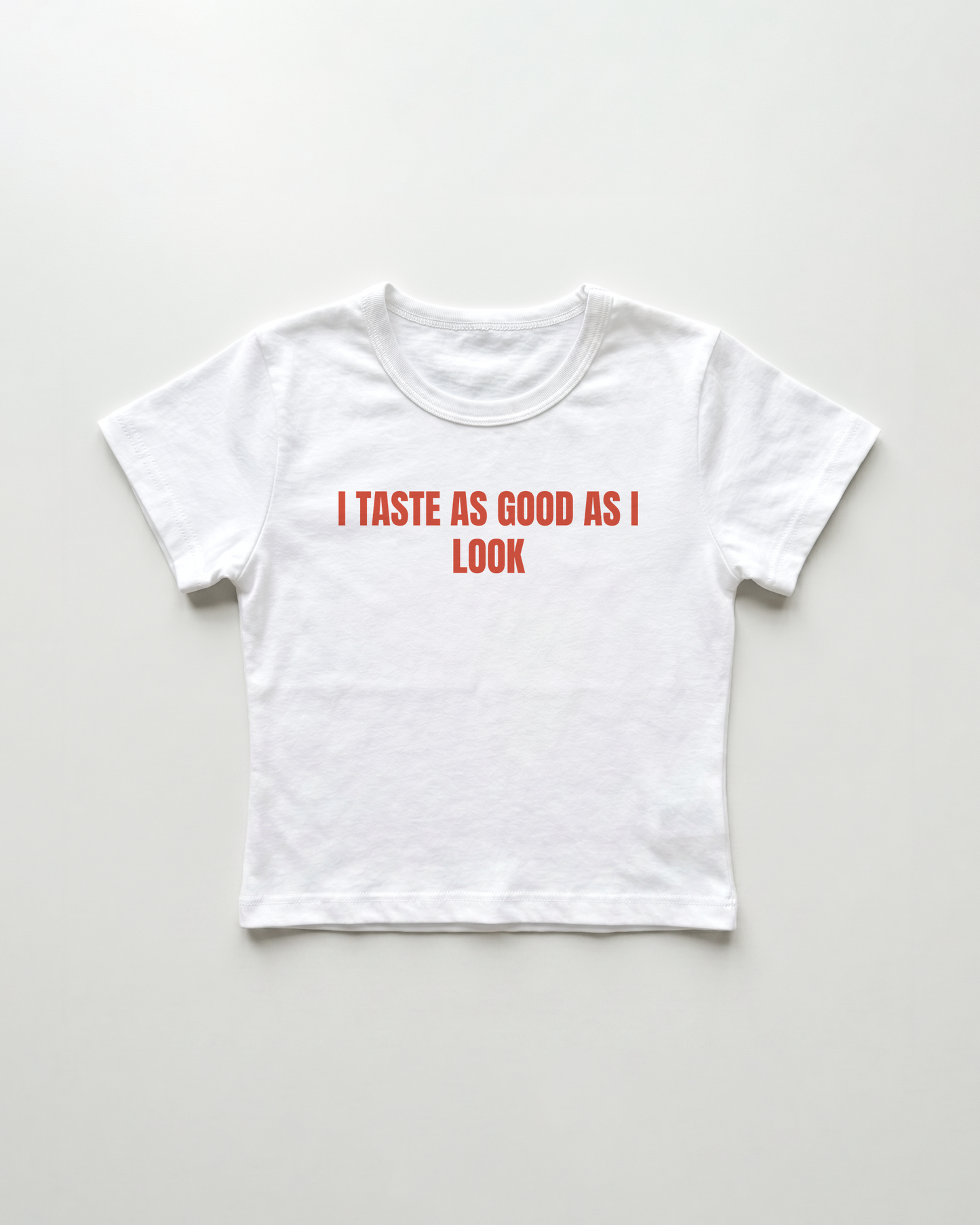 I taste as good as I look cropped Baby Tee