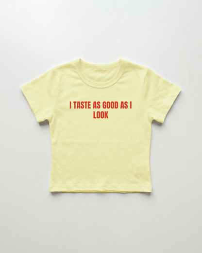 I taste as good as I look cropped Baby Tee