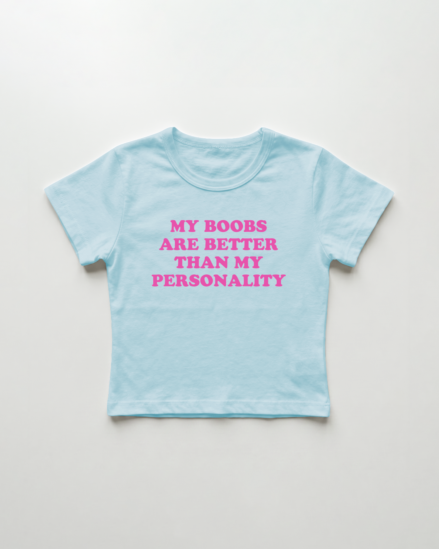 my boobs are better than my personality cropped Baby Tee