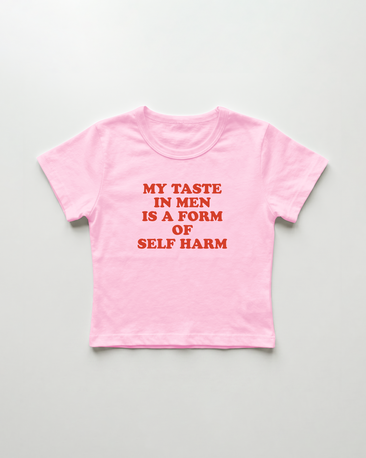 my taste in men is a form of self harm cropped Baby Tee Pink | Lolita Sinz