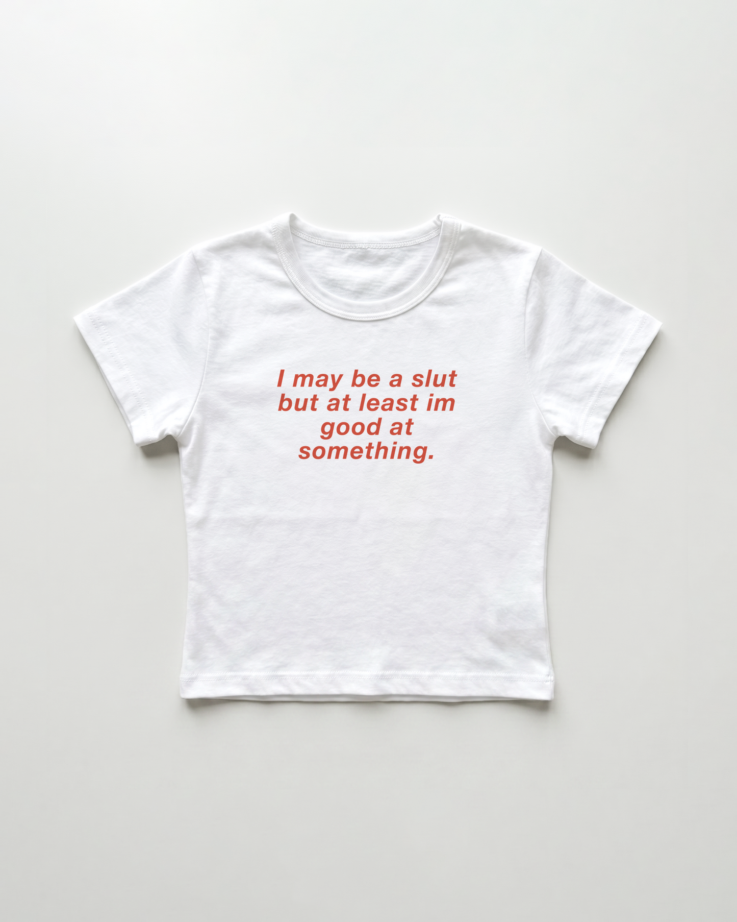 I may be a slut but at least i'm good at something cropped Baby Tee Weiss | Lolita Sinz
