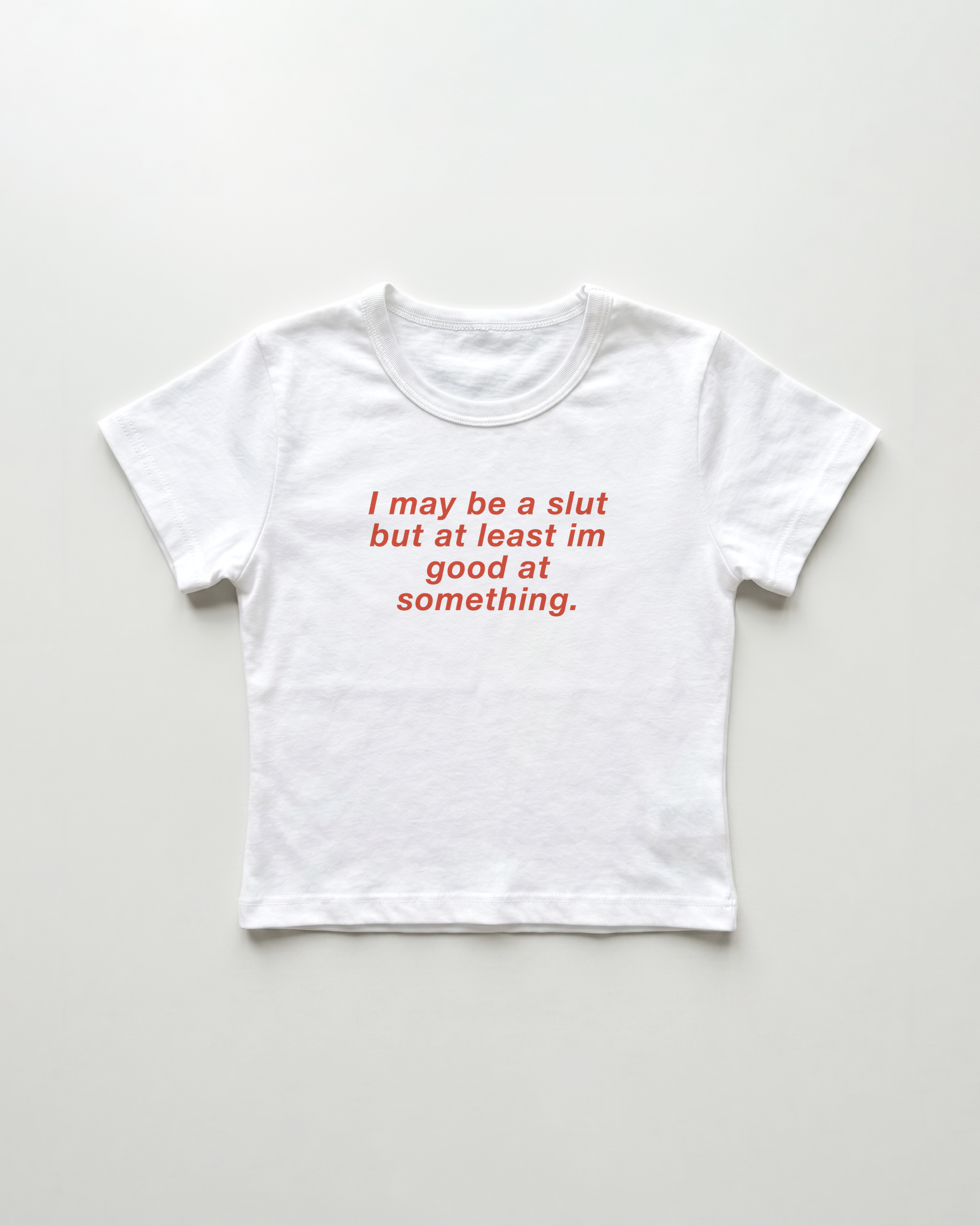 I may be a slut but at least i'm good at something cropped Baby Tee Weiss | Lolita Sinz