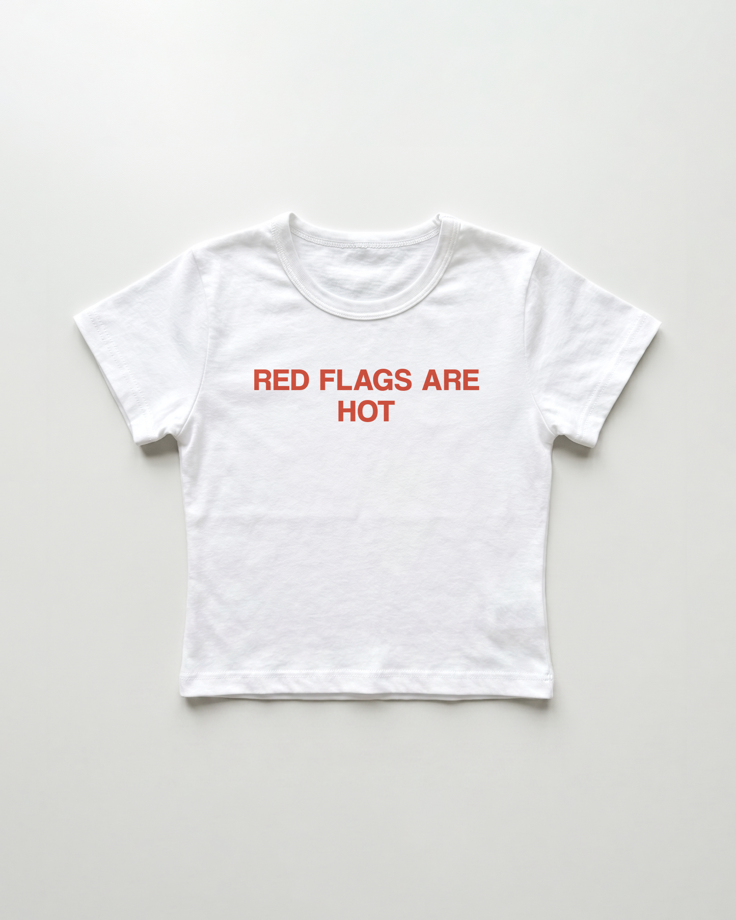 red flags are hot cropped Baby Tee Weiss | Lolita Sinz