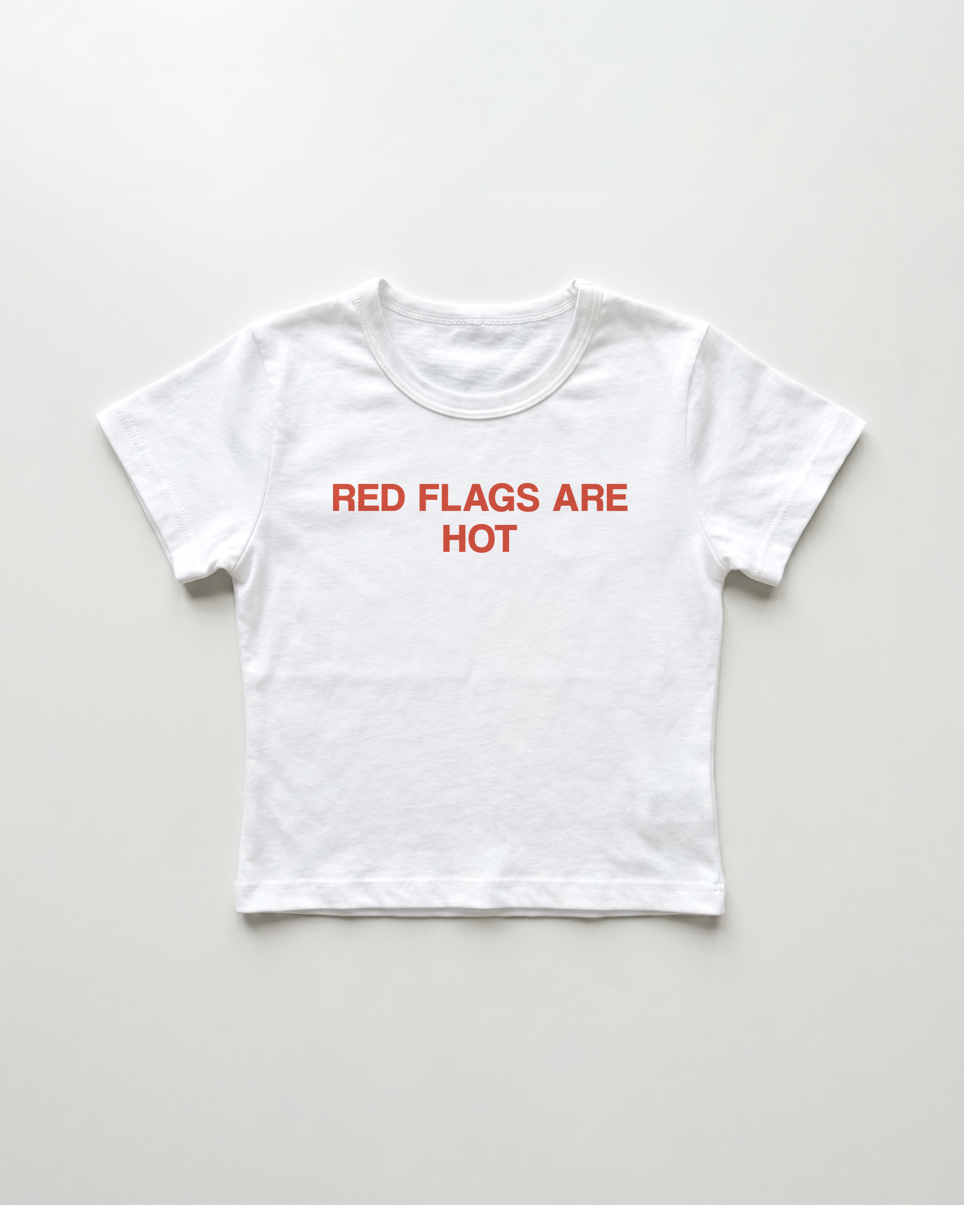 red flags are hot cropped Baby Tee Weiss | Lolita Sinz