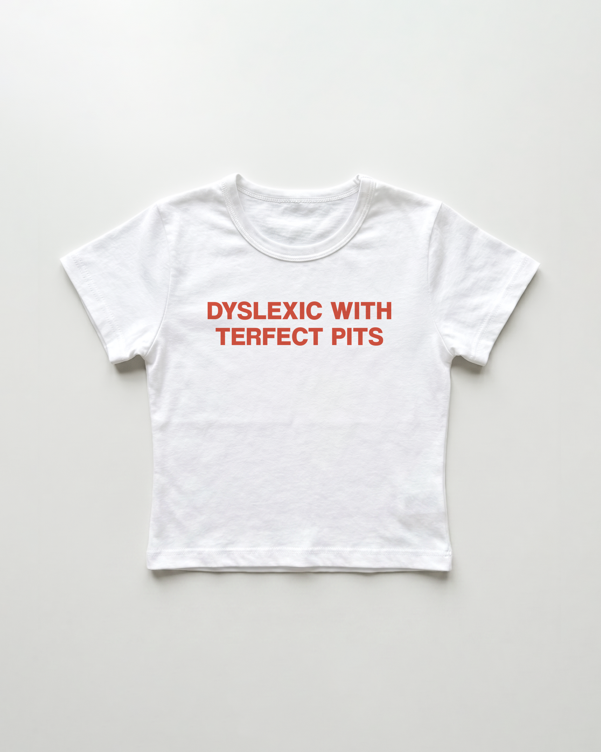dyslexic with perfect tits cropped Baby Tee Weiss | Lolita Sinz