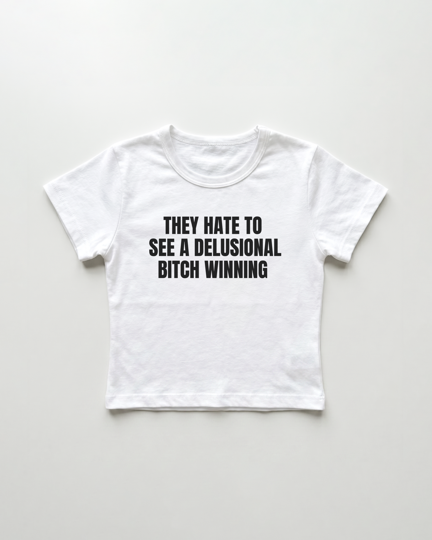 they hate to see a delusional bitch winning cropped Baby Tee