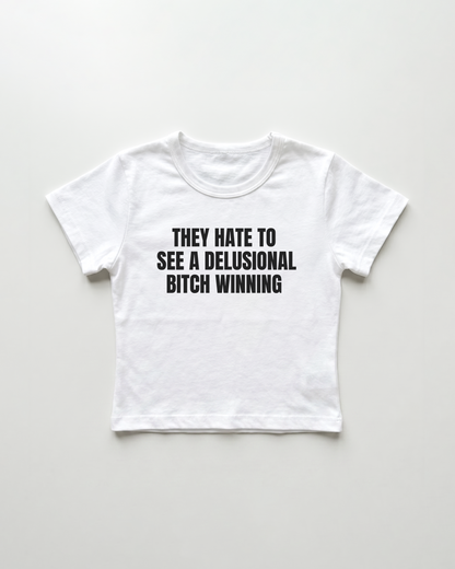 they hate to see a delusional bitch winning cropped Baby Tee