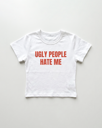 ugly people hate me cropped Baby Tee