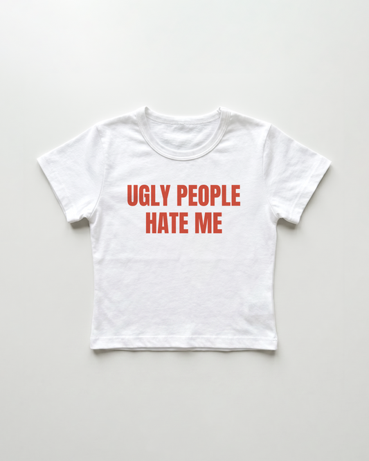 ugly people hate me cropped Baby Tee