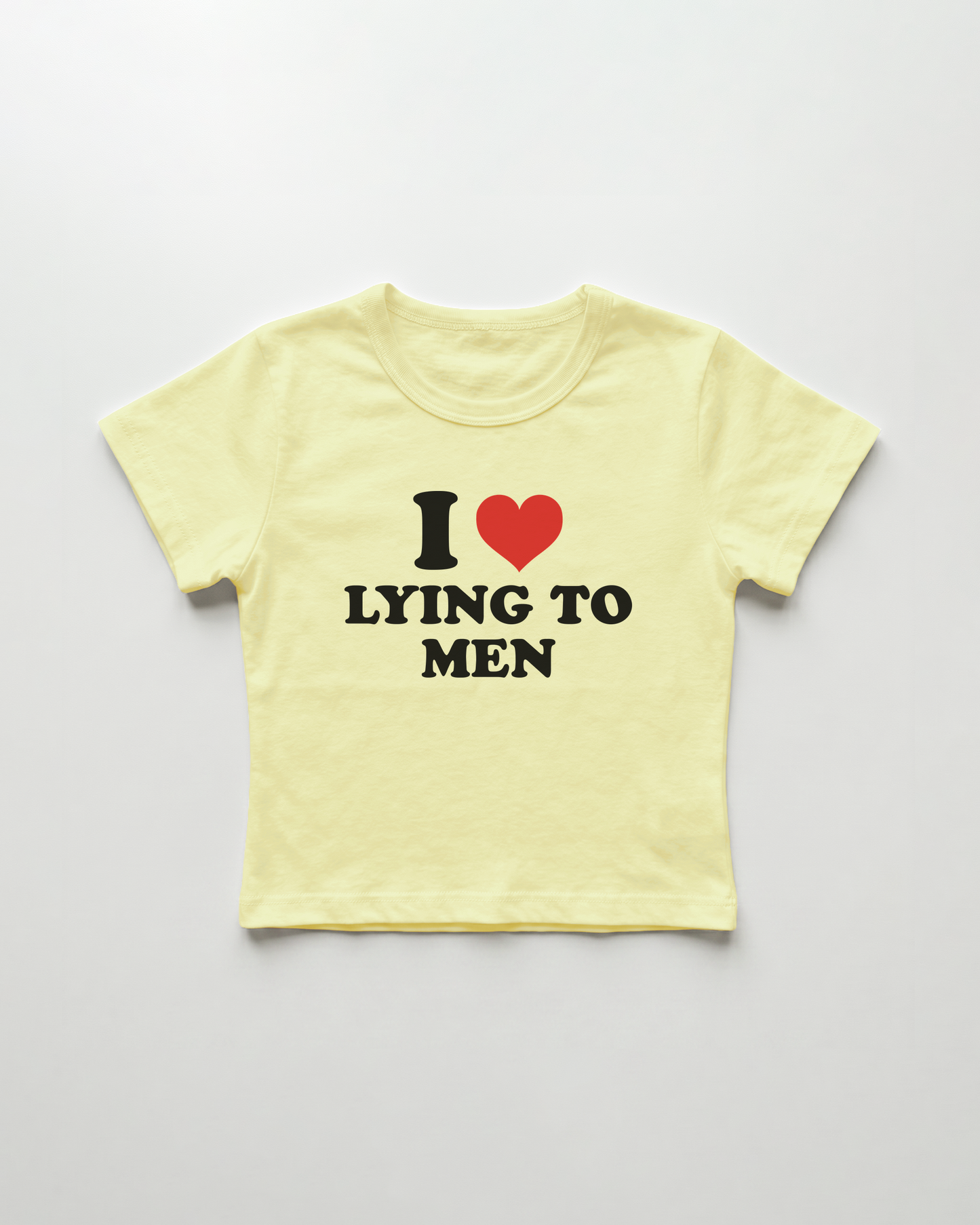 I love lying to men cropped Baby Tee Gelb | Lolita Sinz