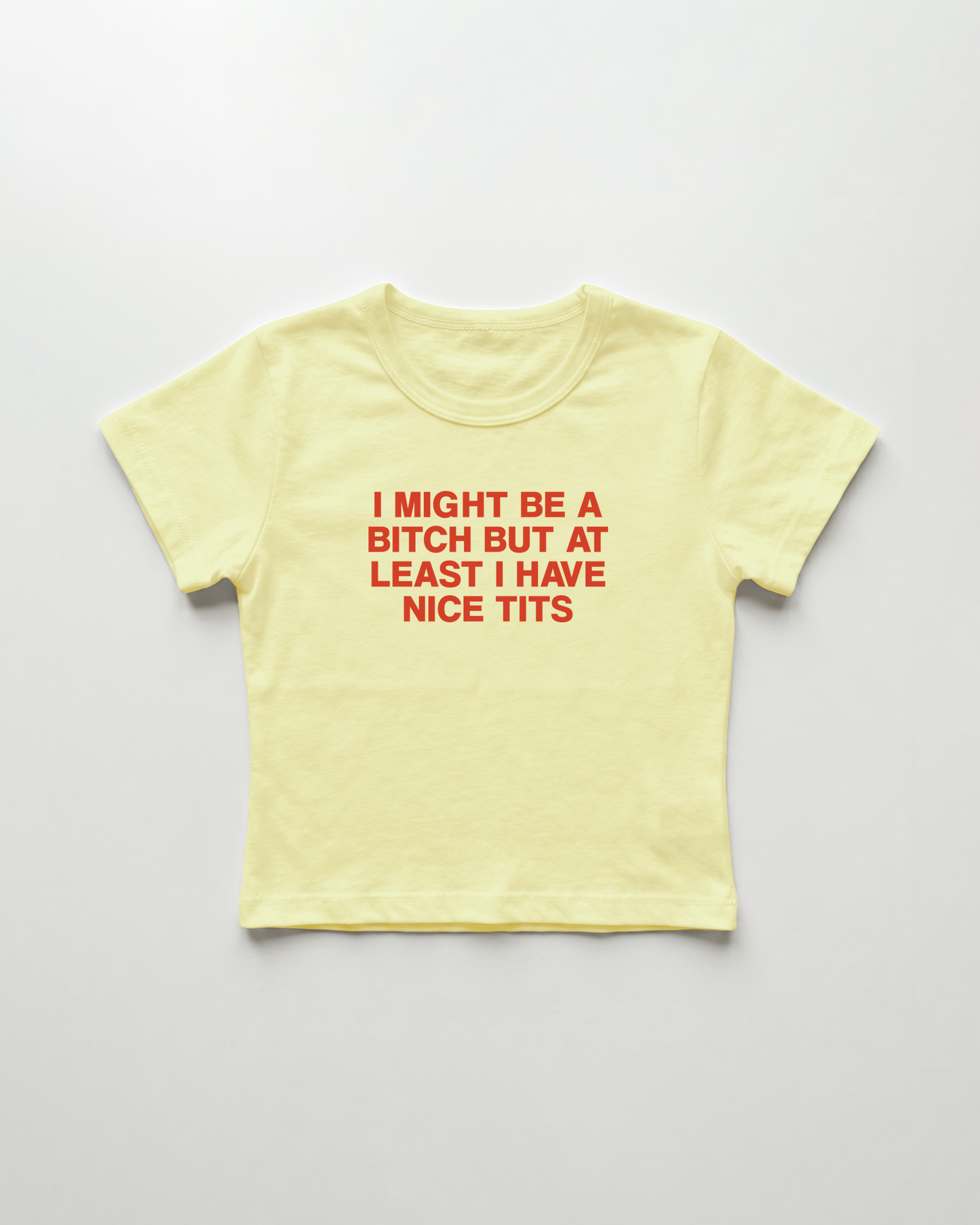 I might be a bitch but at least I have nice tits cropped Baby Tee Gelb | Lolita Sinz