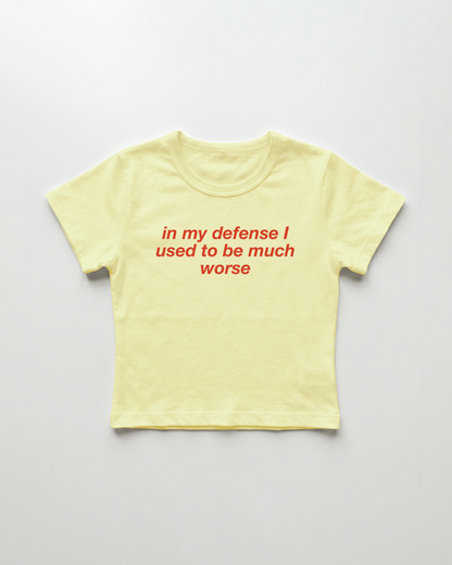 in my defense I used to be much worse cropped Baby Tee Gelb | Lolita Sinz