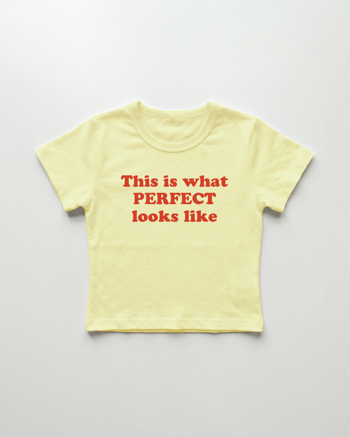 this what perfect looks like cropped Baby Tee Gelb | Lolita Sinz