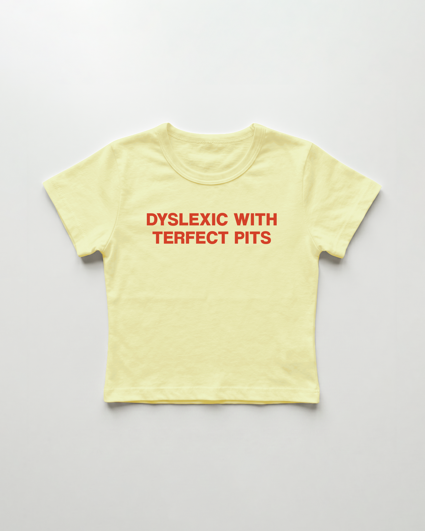 dyslexic with perfect tits cropped Baby Tee Gelb | Lolita Sinz