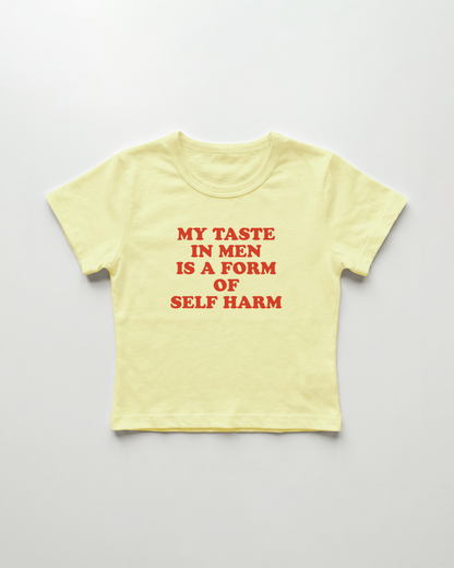 my taste in men is a form of self harm cropped Baby Tee Gelb | Lolita Sinz