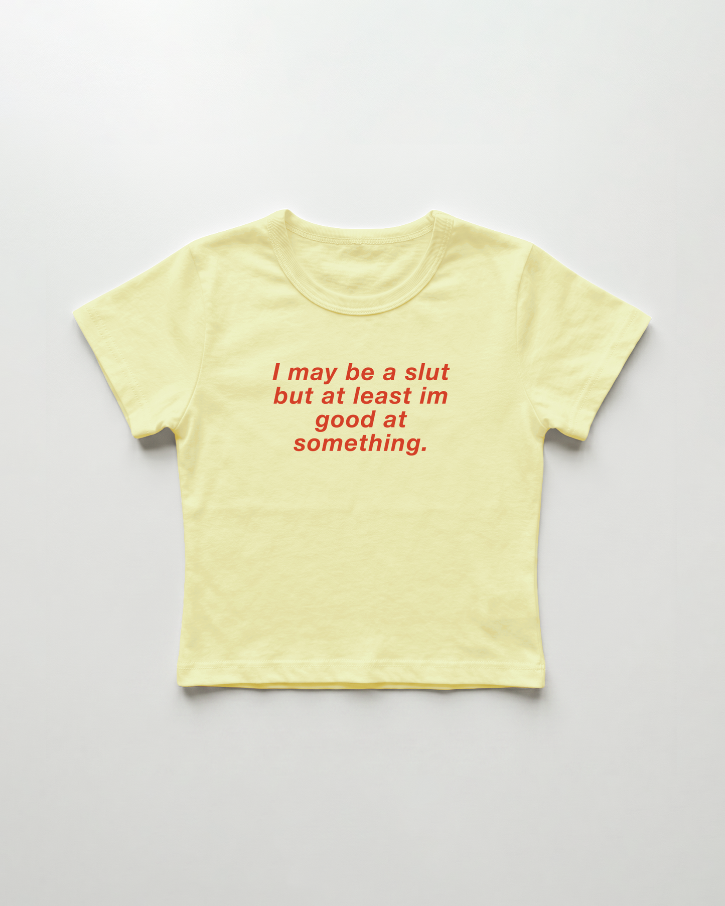 I may be a slut but at least i'm good at something cropped Baby Tee Gelb | Lolita Sinz