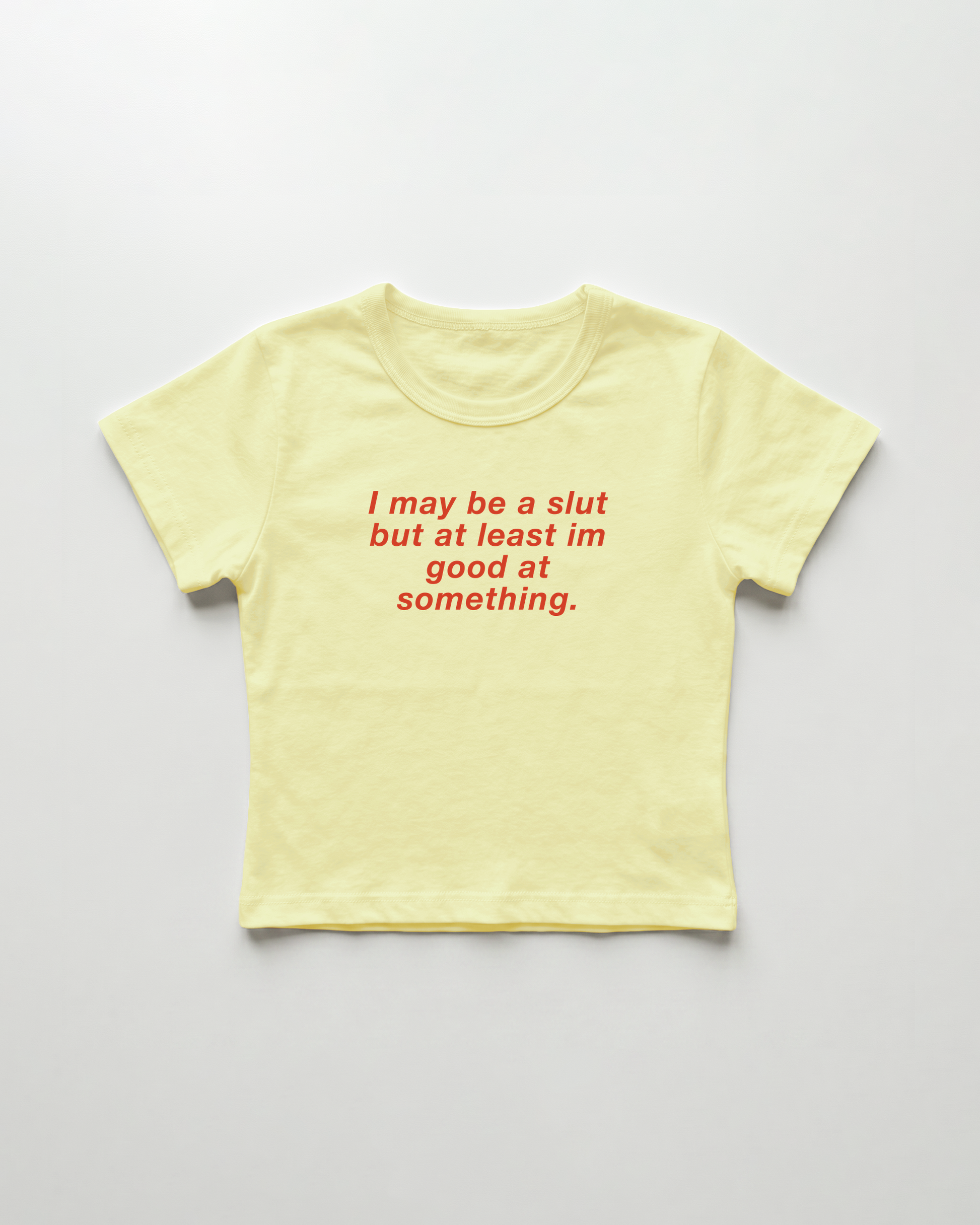 I may be a slut but at least i'm good at something cropped Baby Tee Gelb | Lolita Sinz