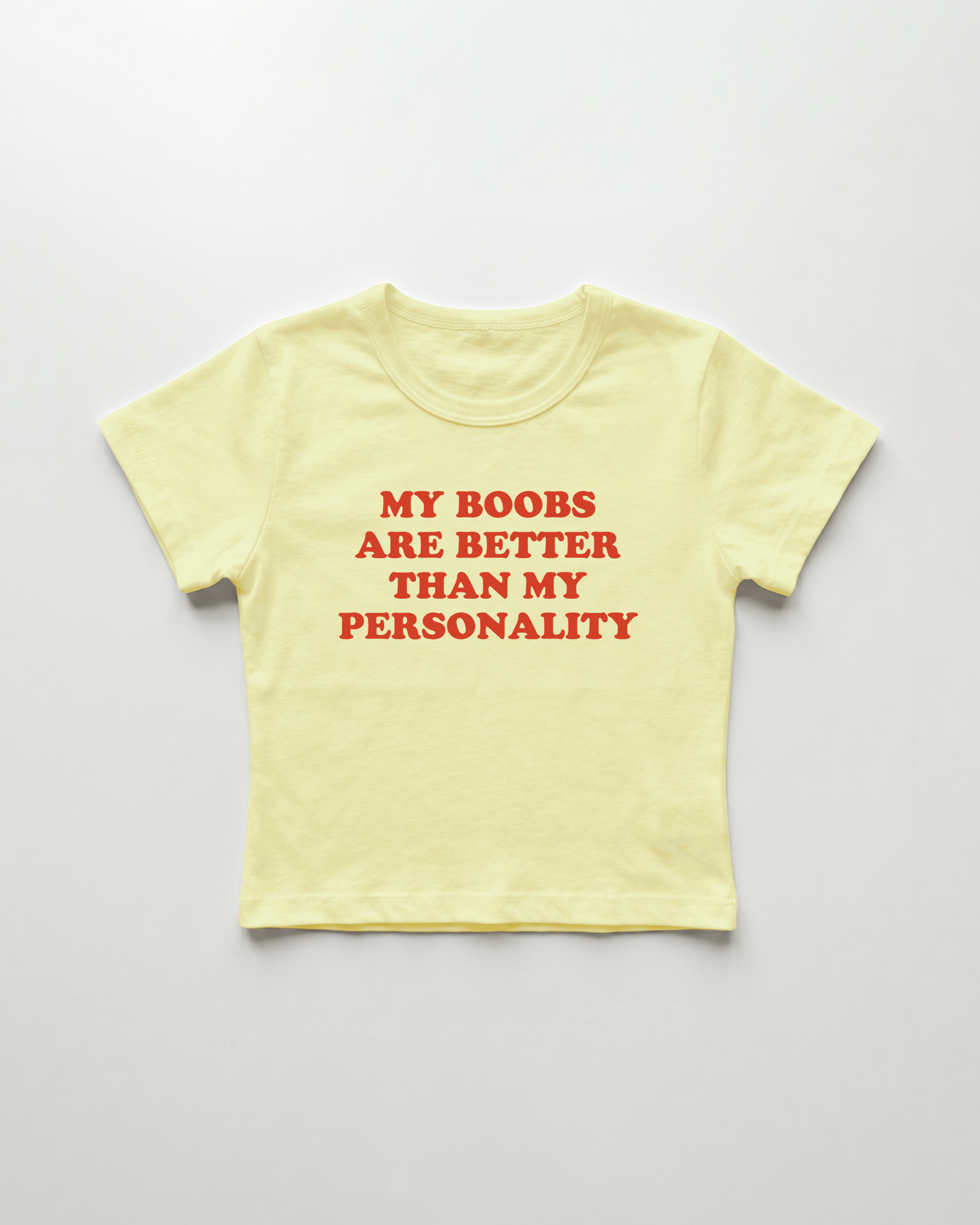 my boobs are better than my personality cropped Baby Tee Gelb | Lolita Sinz