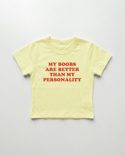 my boobs are better than my personality cropped Baby Tee Gelb | Lolita Sinz