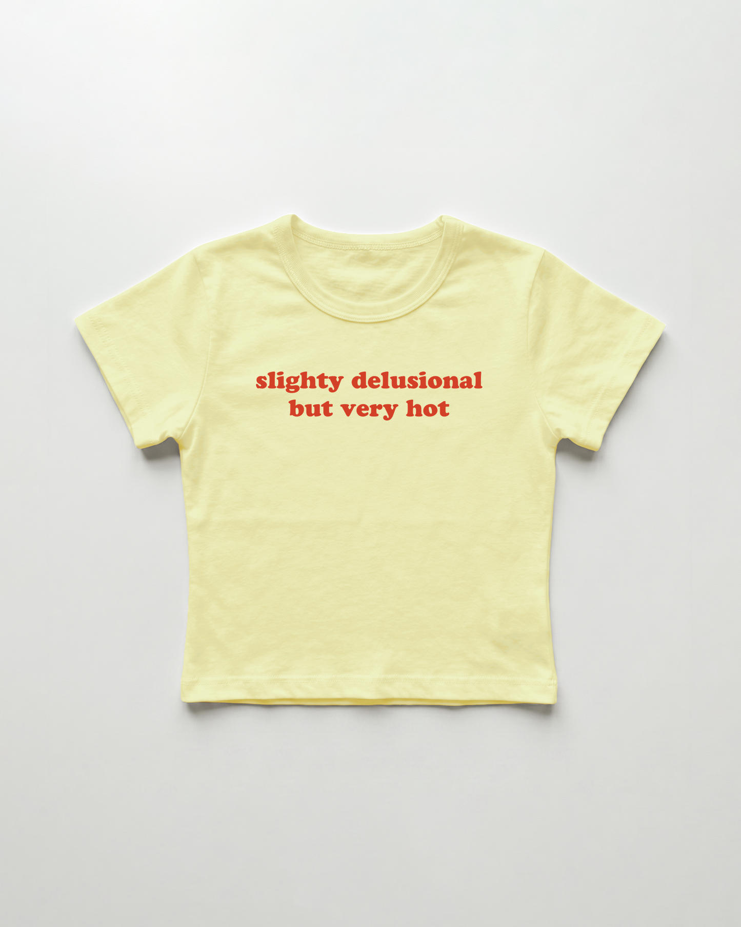 slightly delusional but very hot cropped Baby Tee Gelb | Lolita Sinz