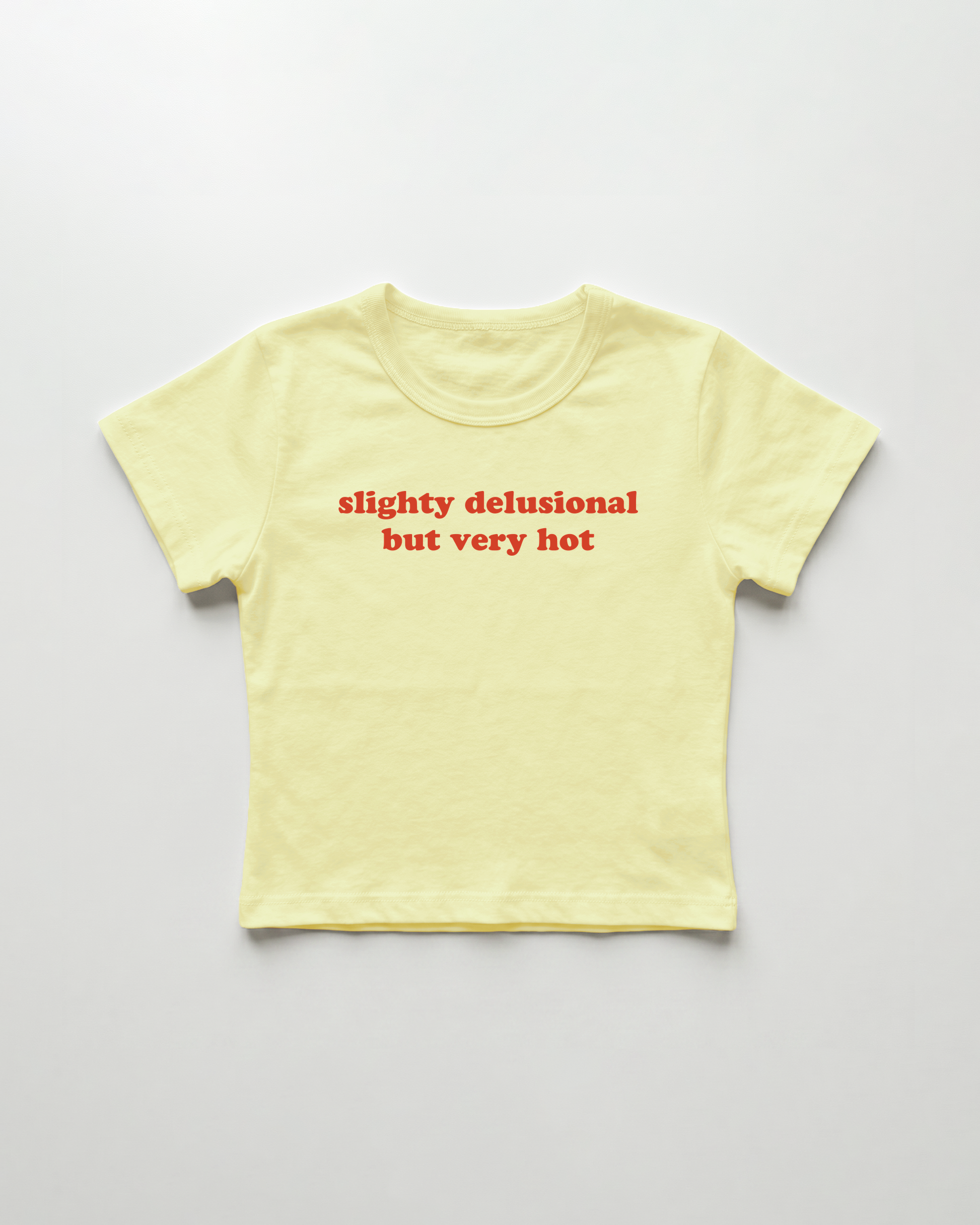 slightly delusional but very hot cropped Baby Tee Gelb | Lolita Sinz